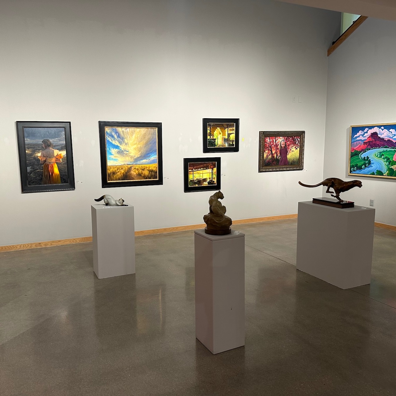 gallery space with colorful art